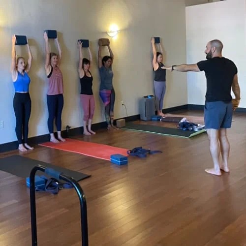 Students in a handstand workshop